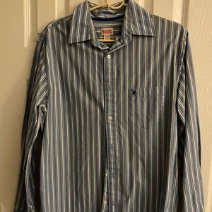 Men’s striped button up shirt.